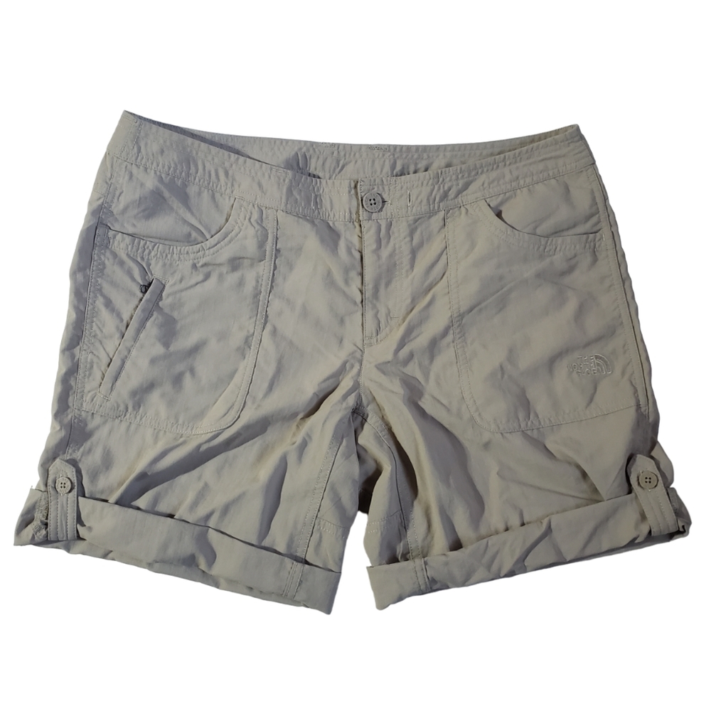 The North Face tan hiking convertible roll up cargo shorts size 12 women's